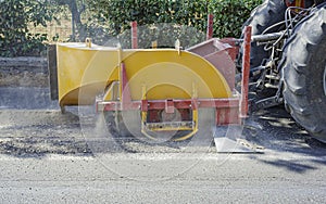 wreath with cones for drilling rock mounted on mini excavator