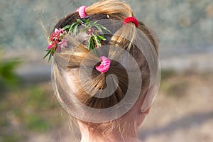 Wreath of hair with pink flowers rear view