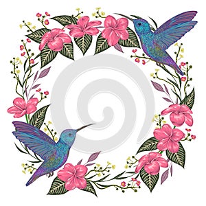 Wreath with hummingbird, tropical flowers and leaves. Exotic flora and fauna.