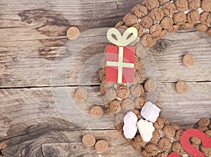 Wreath made of pepernoten on wooden background