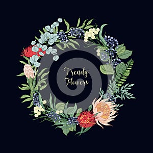 Wreath made of trendy beautiful blooming floristic flowers or flowering plants. Beautiful round floral decoration photo