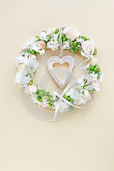 Wreath with roses, hortensias and viburnum