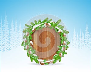 Wreath from snowy fir tree branch and cones on round wood border. Winter forest christmas horizontal background