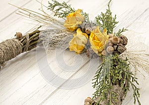 Wreath from a vine with roses. Handmade decor. Wreath of real twigs