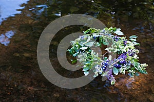 Wreath on water. Slavic divination, tradition. Outdoor