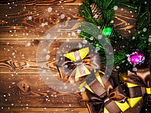 Wreath on the wooden board. Wrapped gift boxes. Christmas and New year concept