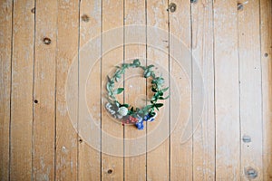 Wreath on the wooden floor