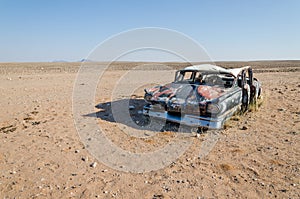 Wreck of classic saloon car abandoned deep in the Namib Desert of Angola