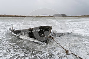 The wreck of a frozen fishing boat
