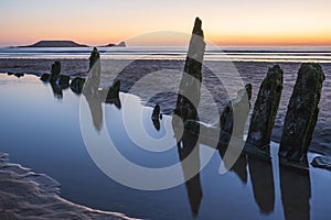 Wreck of Helvetia at sunset Rhossili Bay, Gower, Wales, UK