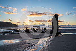 Wreck of Helvetia at sunset, Rhossili Bay, Wales, UK