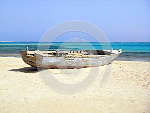 Wreck of Old Fishing Boat on Deserted Beach