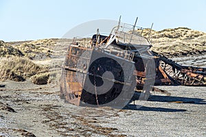 Wreckages on San Gregorio beach, strait of Magellan, Chile photo