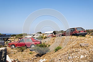 Wrecked and abandoned cars in the island of Patmos, Greece