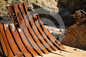 Wrecked boat hull part looking like metal ribs