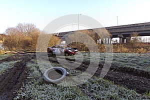 Wrecked stolen car, with graffiti