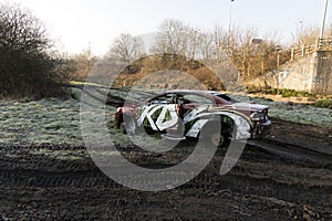 Wrecked stolen car, with graffiti