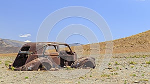 Wrecked Vintage Car in the desert