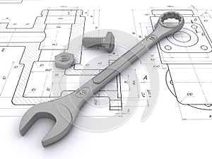 Wrench, bolt and nut against engineering drawings