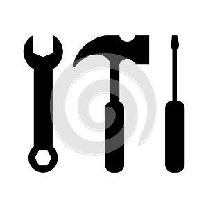 Wrench, hammer and screwdriver silhouette black icons. Wrench, hammer and screwdriver hardware icon set. photo