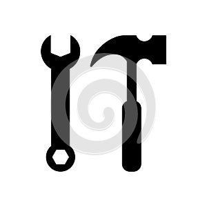 Wrench and hammer silhouette black icons. Wrench and hammer tools icon set.