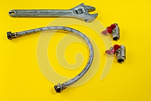 Wrench, safety valve on a colored background