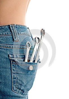 Wrenches in an attractive females back pocket