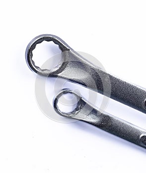 wrenches in several different sizes on a white background