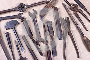 Wrenchs,various tools on wooden background