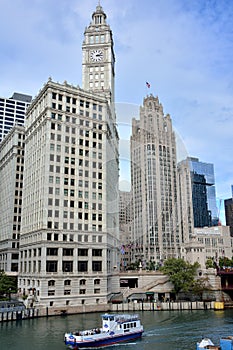 Wrigley Clock Tower and Tribune building beside Chicago river