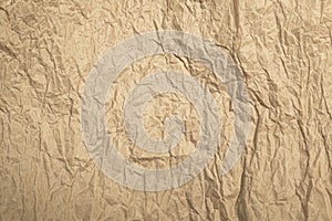 Wrinkled beige kraft paper background