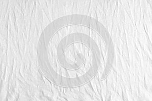 Wrinkled, crumpled white jersey fabric texture background