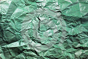 Wrinkled paper background. Texture of crumpled paper. Texture of crumpled old paper closeup