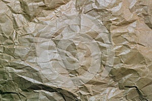 Wrinkled paper background. Texture of crumpled paper. Texture of crumpled old paper closeup