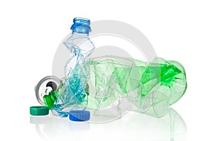 Wrinkled plastiic bottles and can  on white background
