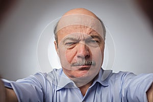 Wrinkles on the forehead of negative events photo