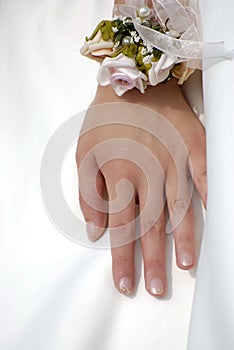 Wrist flower and bride's hand