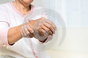 Wrist hand pain of old woman, healthcare problem of senior concept