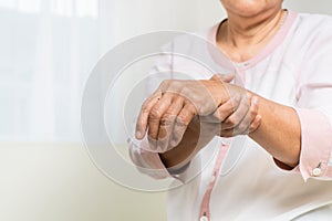 Wrist hand pain of old woman, healthcare problem of senior concept