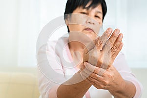 Wrist hand pain of old woman, healthcare problem of senior concept