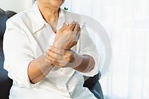 Wrist hand pain of old woman, healthcare problem of senior concept