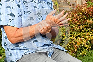 Wrist pain. Arthritis. Senior in pain. photo