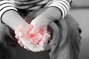 Wrist pain is one of the symptoms that can indicate