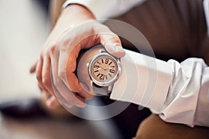 Wrist watch with brown strap