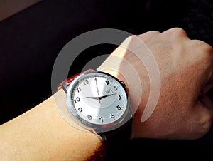 Wrist watch on hand