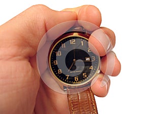 Wrist watch on hand isolated