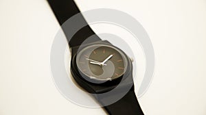 Wrist watch that tells the time on white background