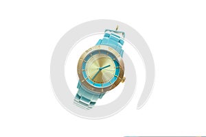 Wristwatch mechanical watch with rubber blue belt with round clock face and gold contour. Stylish, unisex.White isolated backgroun