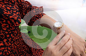 Wristwatches on women`s hand
