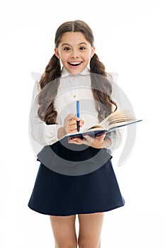 Write note to remember. Child school uniform smart kid happy make note. Child girl happy school uniform clothes holds